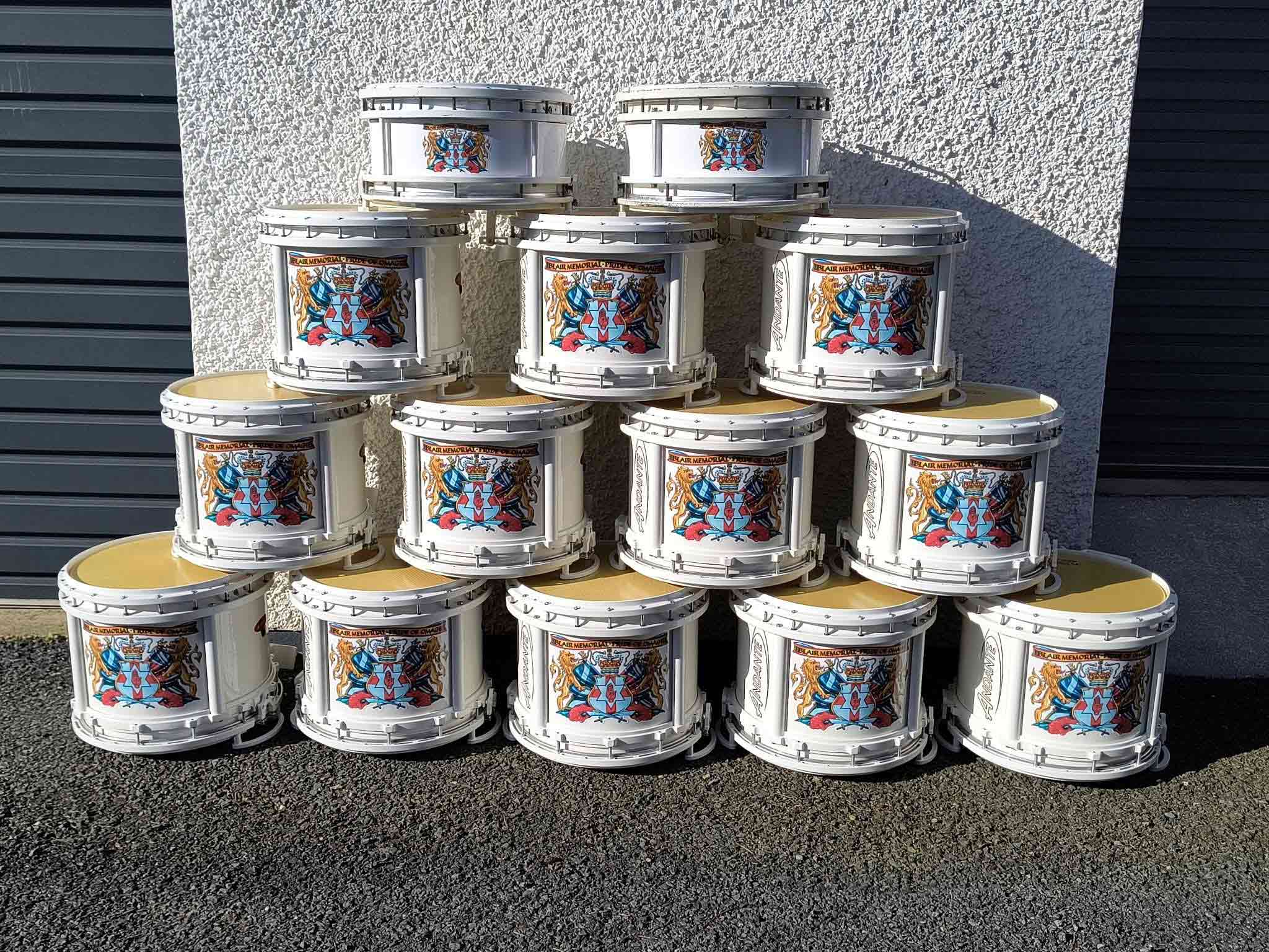 marching side drums stacked white