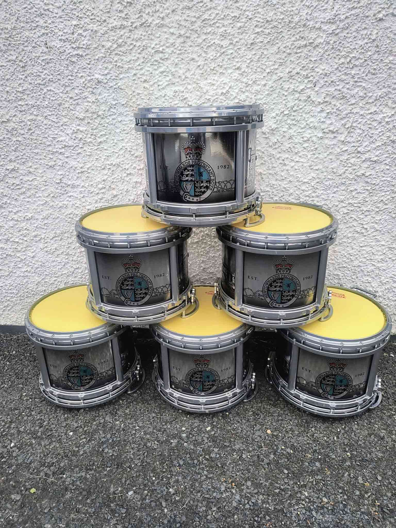 side marching drums stacked